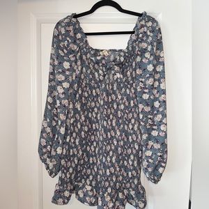 Blue dress, opening in front, super cute ruffle details. Worn once